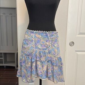 Beautiful floral, ruffle mini skirt.
